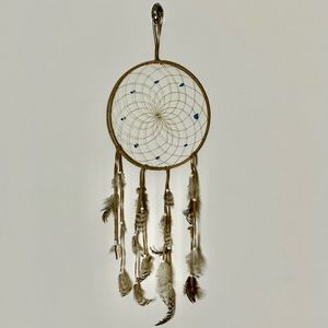 Dream catcher with beads and feathers.